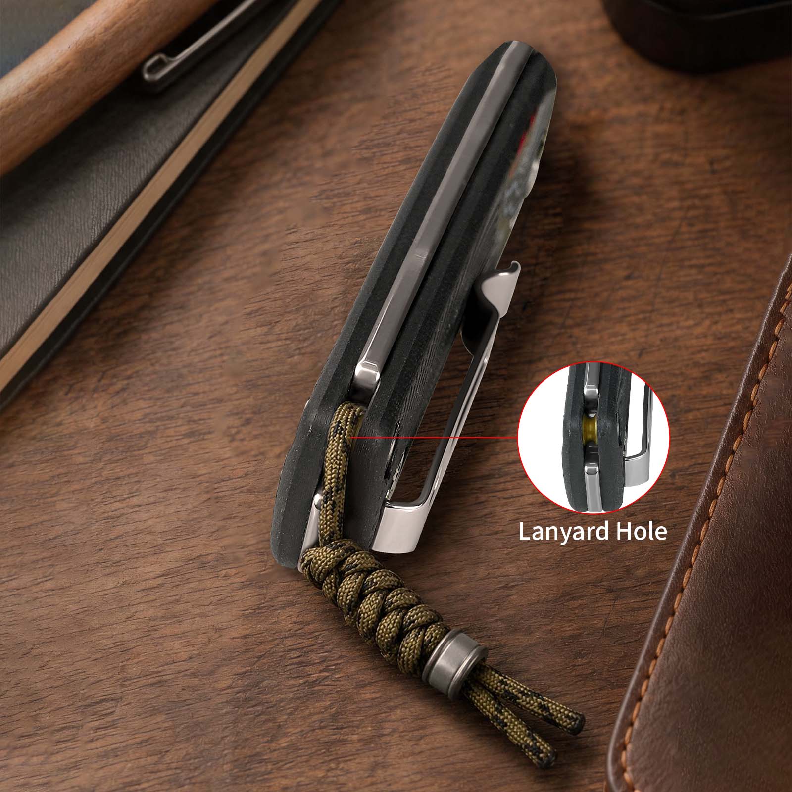 Close-up of the lanyard hole on the SRM Dome 106M-GK slip joint knife