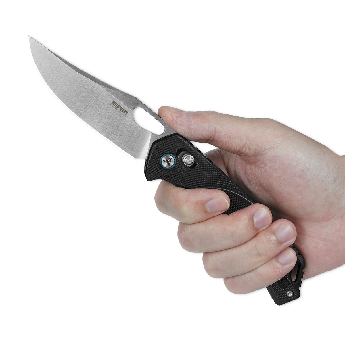 Hand holding SRM Retriever 9201 folding hunting knife